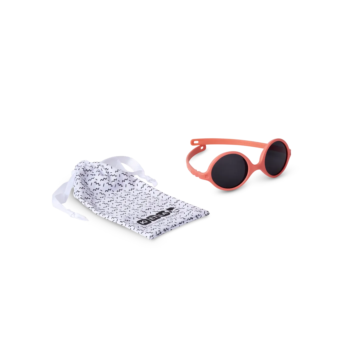 packshot lunettes de soleil bébé diabola pamplemousse