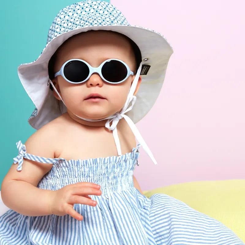 fille portant chapeau antiuv kapel