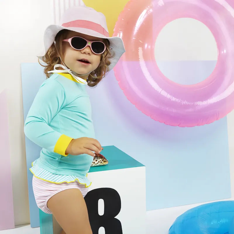 Enfant portant chapeau antiuv kapel rose